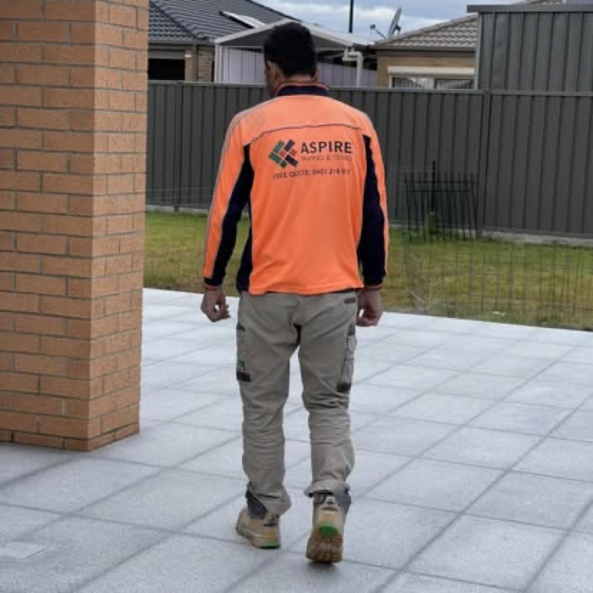 Concrete crew in high-visibility workwear on site
